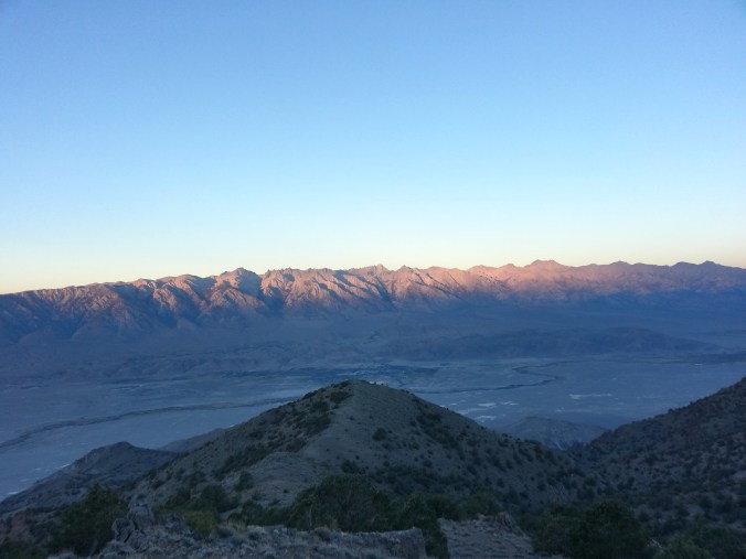 Morning light hitting the High Sierras, as seen from the crest of the Inyo Mountains