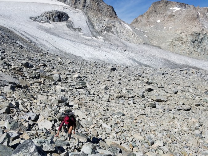 Lia headed up Alpine Pass, knifepoint glacier in the background